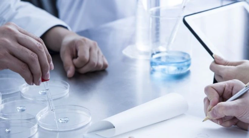 Professional chemical inspector conducting laboratory sample testing and data analysis for industrial quality inspection Professional chemical inspector conducting laboratory sample testing and data analysis for industrial quality inspection